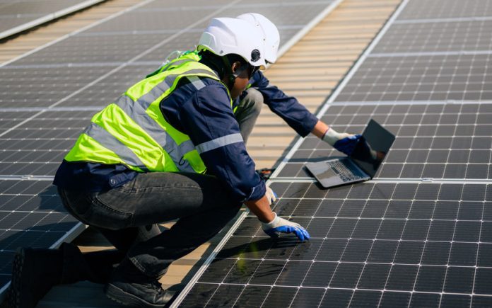 Professional engineer technician with safety helmet checking system